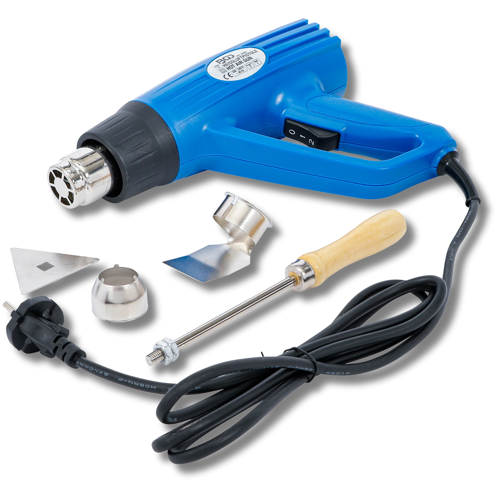 Bild eines Heißluftföns mit zugehörigem Werkzeug, fotografiert von schräg vorne